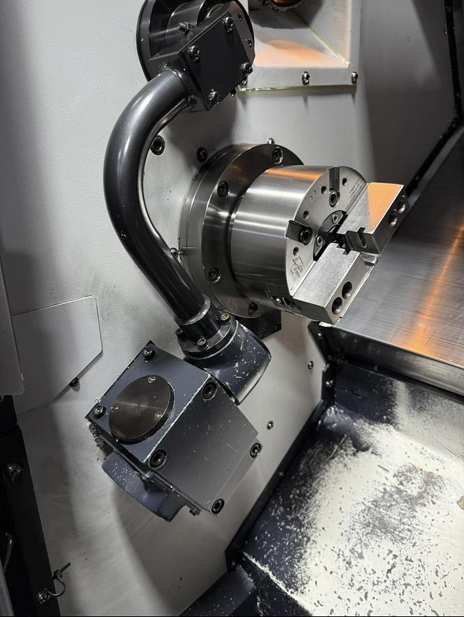 Used 2011 Doosan Lynx 220A-NT, Fanuc iSeries CNC Control, tail stock, 6” 3-Jaw Chuck, foot control, 12 station turret, no tail stock, s/n ML0006-005208