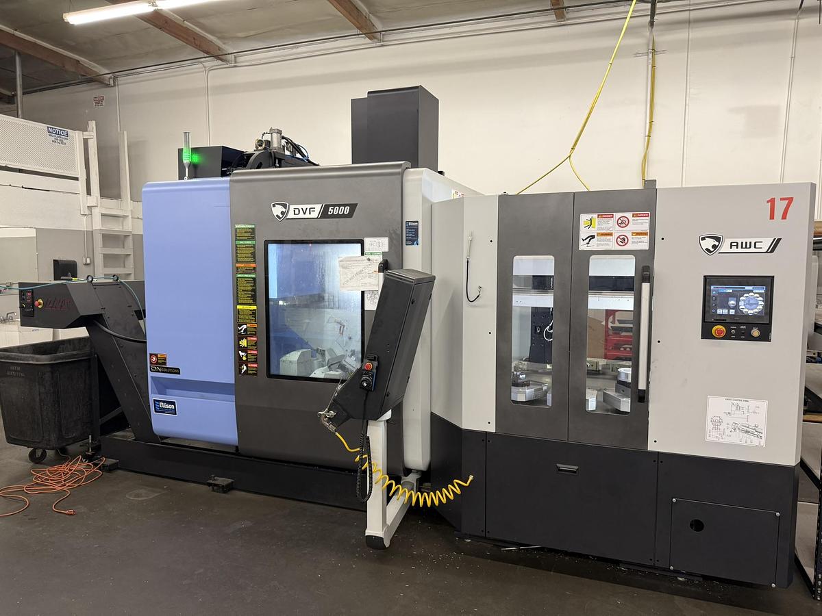 Used 2023 Doosan Mdl DVF-5000 5 Axis CNC Vertical Machining Center w/ 12 Pallet AWC, New Price $500,000