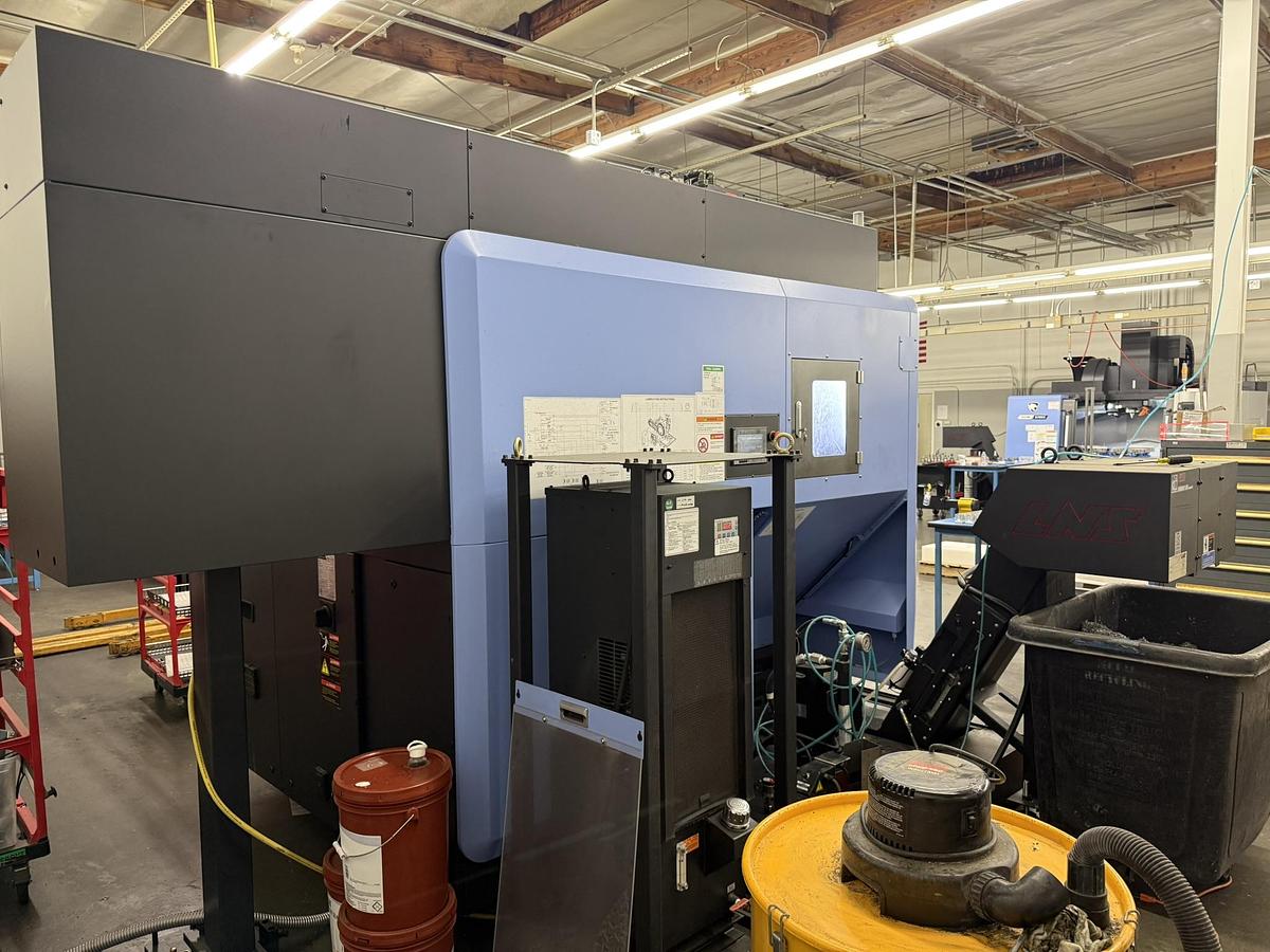 Used 2023 Doosan Mdl DVF-5000 5 Axis CNC Vertical Machining Center w/ 12 Pallet AWC, New Price $500,000