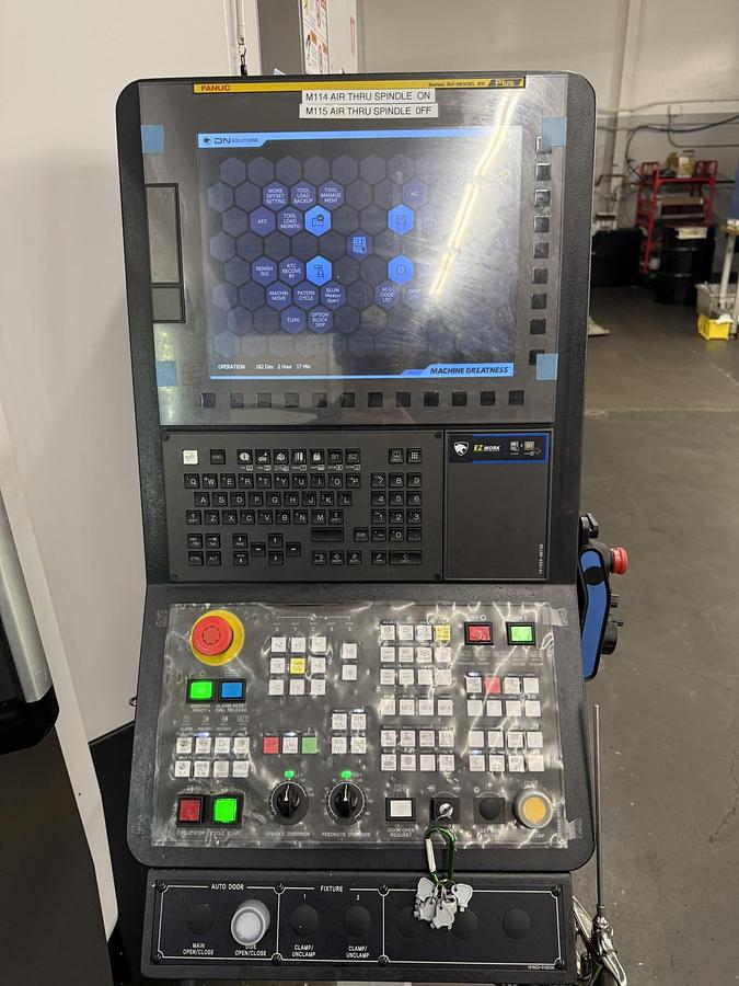 Used 2023 Doosan Mdl DVF-5000 5 Axis CNC Vertical Machining Center w/ 12 Pallet AWC, New Price $500,000