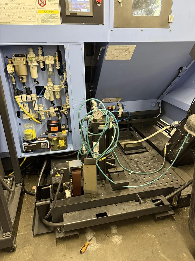 Used 2023 Doosan Mdl DVF-5000 5 Axis CNC Vertical Machining Center w/ 12 Pallet AWC, New Price $500,000