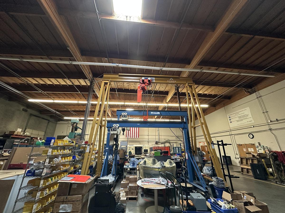 Used SPANCO GANTRY, MODEL #7PF1818 MANUAL PF SERIES GANTRY CRANE STEEL FIXED HEIGHT AND SPAN Capacity: 15000 lbs Overall Span: 18' - 0'' Clear Span: 15' - 0'' Height Under Beam: 18' - 0'' Overall Height: 19' - 6'' **(Hold)** Tread Width: ± 6' - 8'' Beam Size: S18X54.7#with cap channel Casters: 12'' Polyurethane Tread W/4 Position Swivel Locks Flange Width: 6" End of Gantry Load: 18812 lbs Load per Wheel: 9406 lbs Estimated Weight (Each): 3125 lbs Load per Wheel: 9406 lbs Coating & Painting: PAINT, SPRAY YELLOW   ELEPHANT DAM-7.5-20-3-460-60 Elephant DAM Series Electric Chain Hoist w/ Motorized Trolley Capacity: 7.5 ton metric tons (16,500 lbs.) Chain Length: 20' Pendant Length: 18' No. of Falls: 3 Lifting Speed: 7 FPM 3 Phase - 460v Only - 60Hz Lug mounted to MAS Trolley Flange Range: 5.00" ~ 7.00"" Traversing Speed: 39 FPM Includes E-Stop Pendant and Chain Container Elephant JAPAN -ASME H3 MOTOR - CORROSIVE RESISTANT LOAD CHAIN - JIS / ISO M5 - FEM 2m - IP54 HOIST PROTECTION - IP65 NEMA 4X PENDANT PROT.