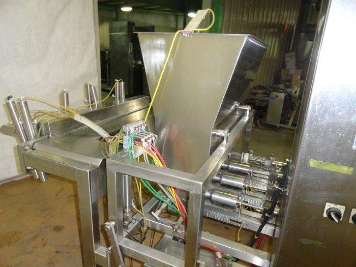 Used FEMC 4 Piston Filler; with (4) dispensing nozzles; Md#3700-000-002