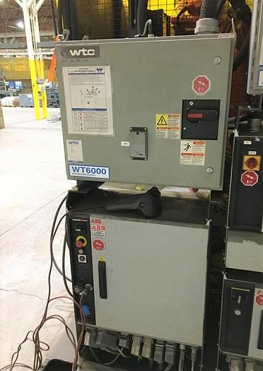 Used ABB IRBP C-1000 SPOT WELDING CELL WITH TWO ABB IRB 6640 180/2.55 ROBOTS & IRC 5 CONTROLLERS & ARO SERVO SPOT WELD GUNS