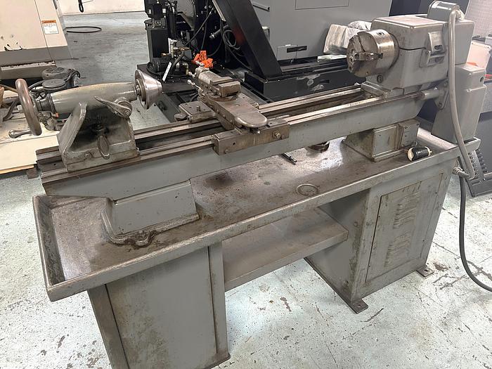 Used 1997 Clausing 5429 Engine Lathe 13" x 35" Capability, Steady Rest, Tailstock, 6" Chuck, Pedestal Cabinet Mount