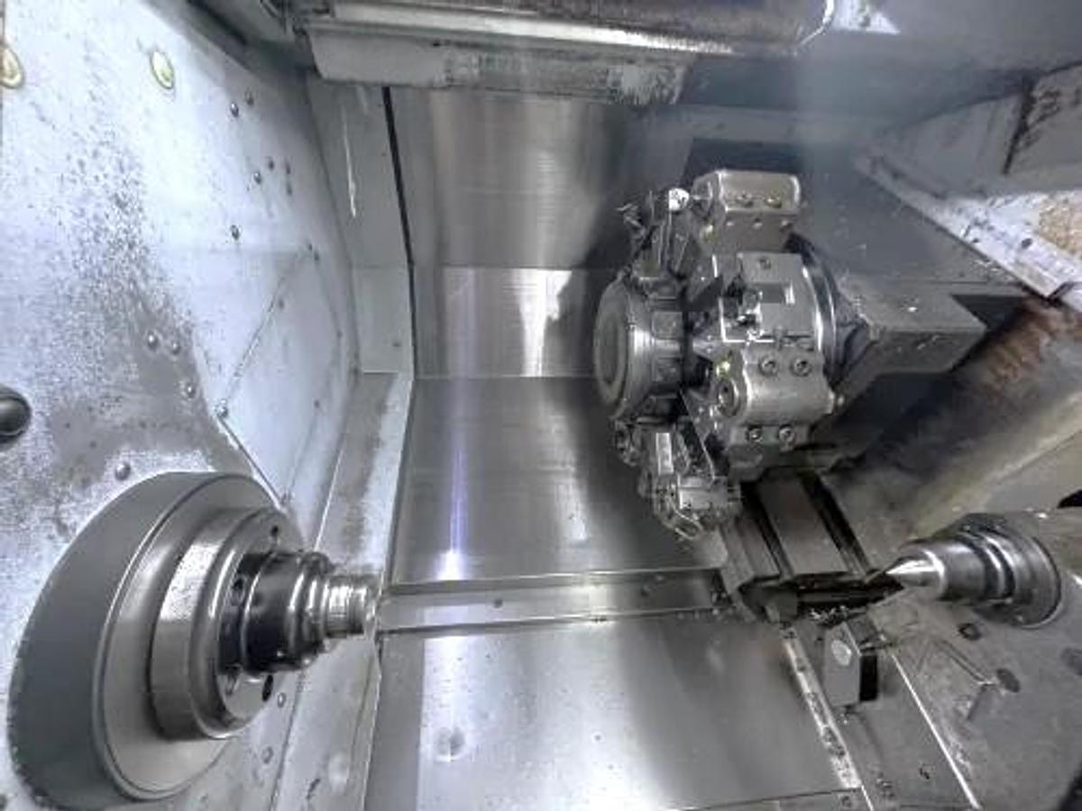 Used 2004 Mori Seiki SL-204MC with C Axis Rotation, Mill/Drilling Capability, Tailstock, Collet Chuck, Chip Conveyor, 2" Bar Capacity