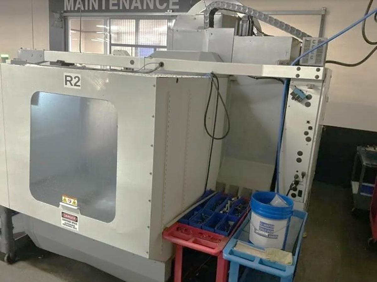 Used 2007 Haas VF5/40 w/ 4th Axis Drive, Haas Wireless Probing, 40 Station ATC, PCool, High Speed Machining, 7500 RPM