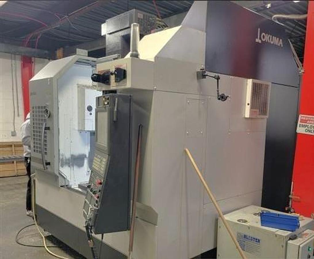 Used 2015 Okuma M560-V with 4th Axis Rotary Table, Renishaw Tool & Part Probing, 15k RPM, 32 Pos. ATC, Chip Claster HPC