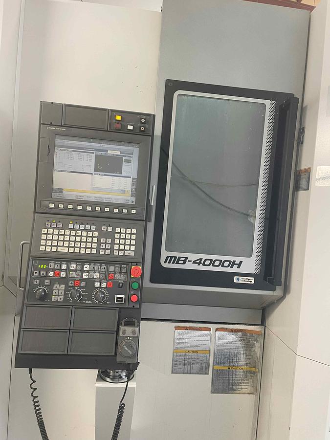 Used 2013 Okuma MB-4000H w/6-Pallets, Probing, Chip Conveyor, 15k RPM Spindle, Only ran Aluminum