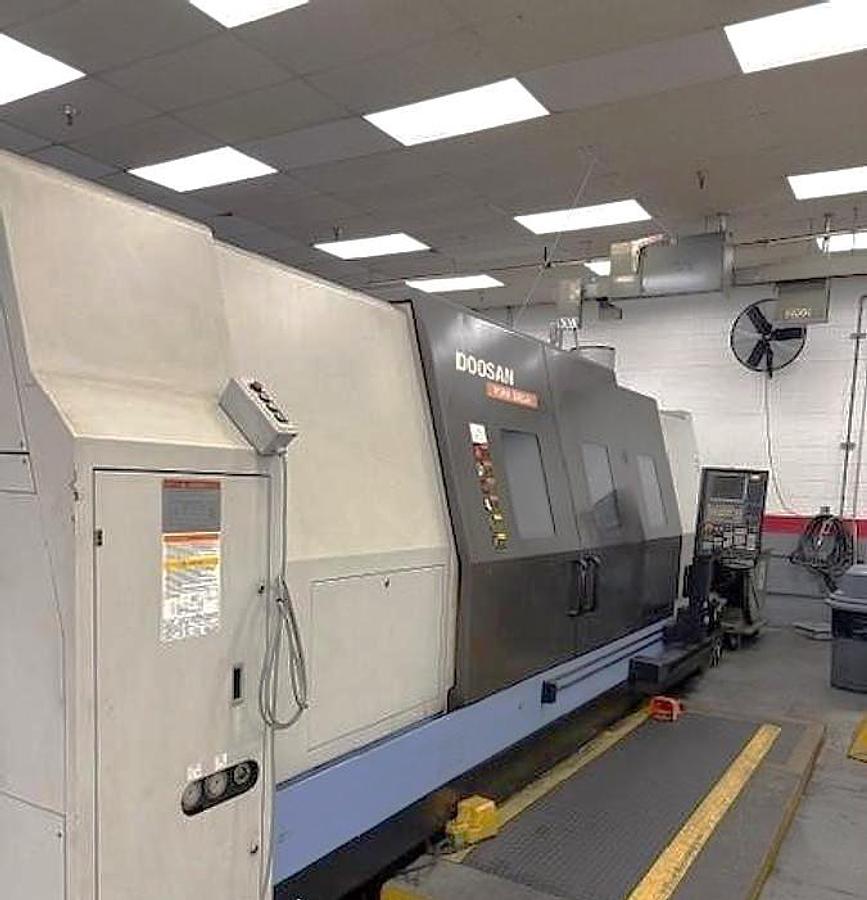 Used 2015 Doosan Puma 800LM with C Axis & Milling, 31.5" 3 Jaw Rohn Air Chk, 12.6" Bar Cap., 126" Turn Length, New RIP Steady Rest, Tailstock, Conveyor