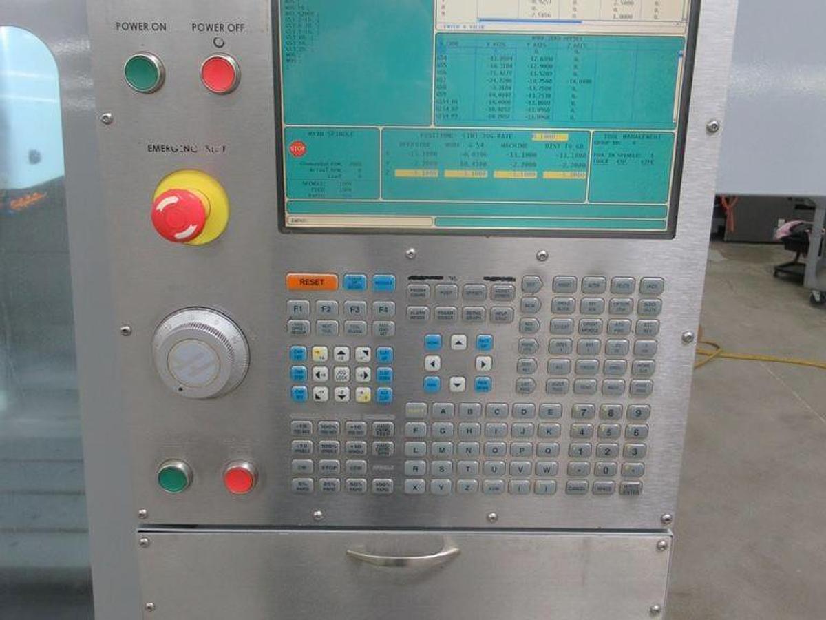 Used 2009 Haas VF2YT with Extended Y Axis Travel, Chip Auger, Rigid Tapping, 2 Spd Gearbox, 7500 RPM, 20 ATC