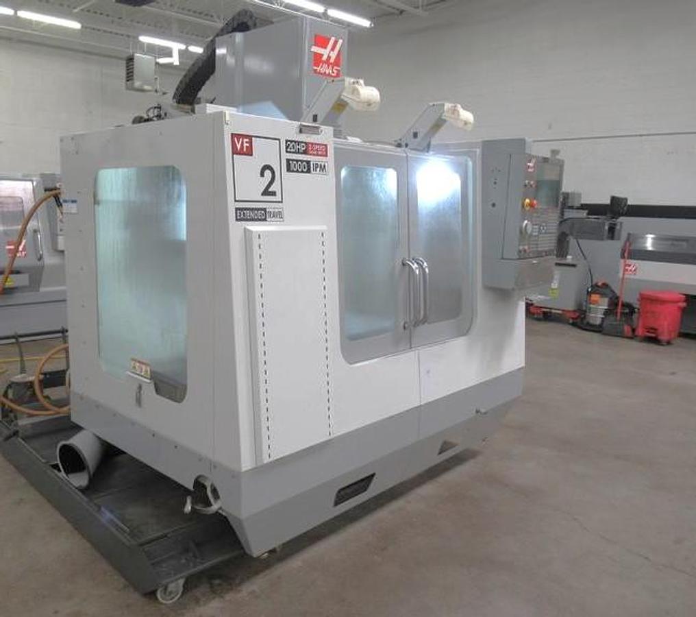 Used 2009 Haas VF2YT with Extended Y Axis Travel, Chip Auger, Rigid Tapping, 2 Spd Gearbox, 7500 RPM, 20 ATC