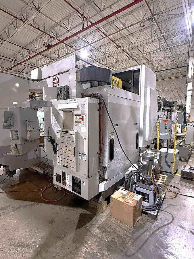 Used 26 Haas EC-1600-4X with 5 Axis Capability, Built In 4th Table, Removable 5th Axis Rotary Table, 50 ATC, Probing, Cool. Thru Spindle