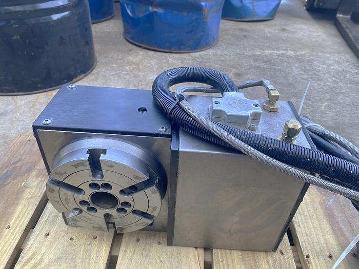 Used 2020 Haas VF-4 with Haas HRT-160 4th Axis Table, Chuck and Tailstock, PCool, Chip Auger