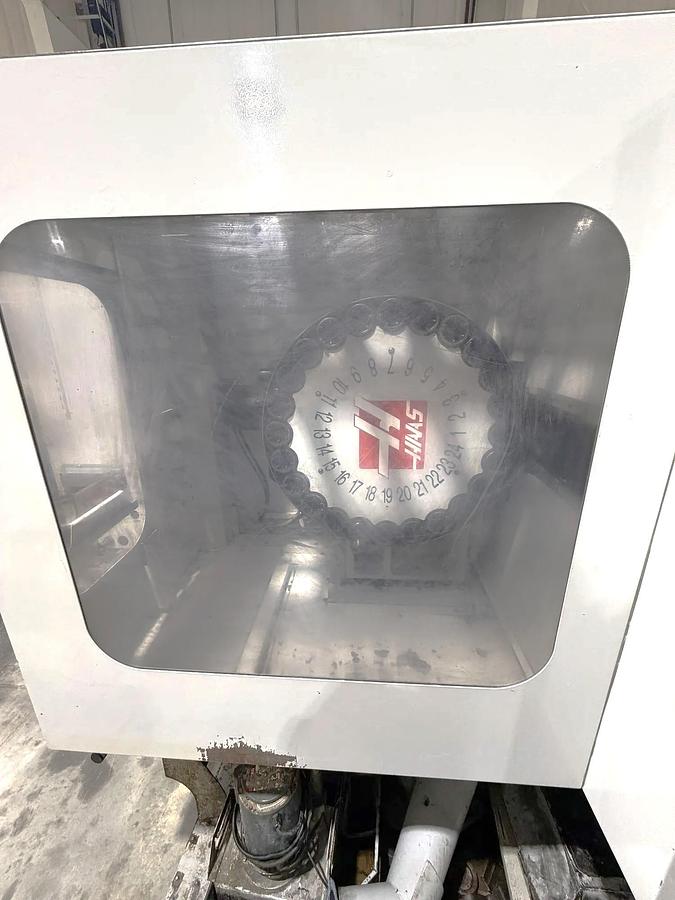 Used 2009 Haas ES-5-4T with HRT 4th Axis Rotary Table, Tool Probing, Remote Jog Handle, Chip Auger