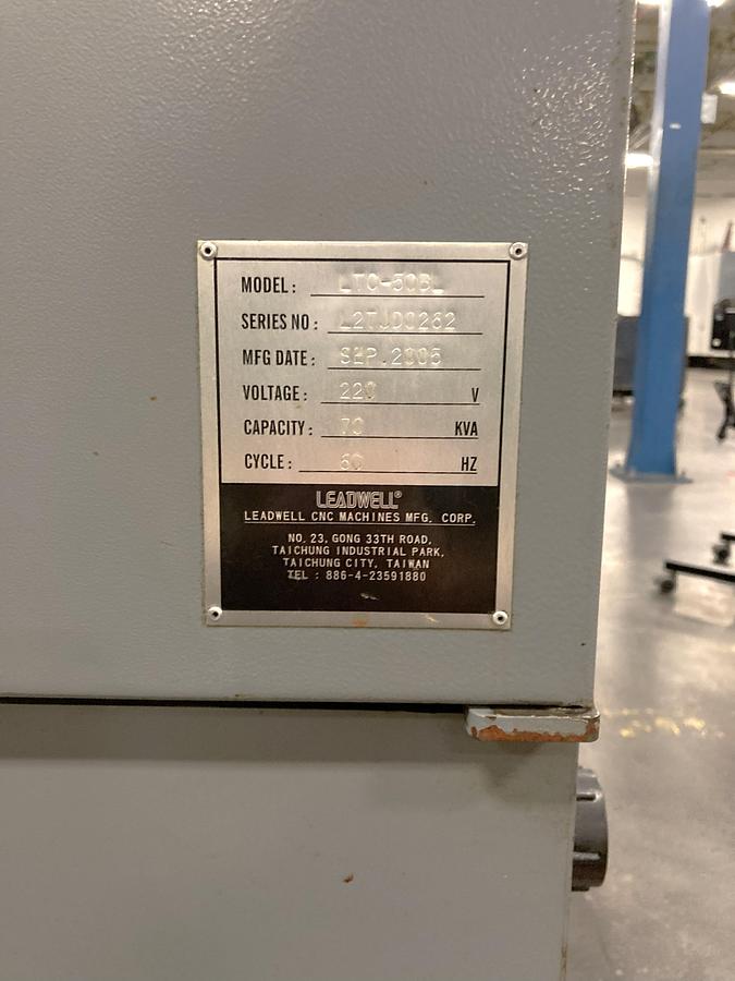 Used 2006 Leadwell LTC50-BL with 18" Hyd Chk, 4.6" Bar Cap., 33.5" sw, 80" cc, 1500 RPM, 50 HP, Steady Rest, Conveyor, Fanuc 0i-TC