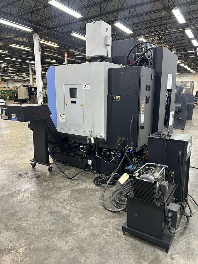Used 2022 DN Solutions Mynx 5400/50 II with 4th Axis Drive, CAT50 Big Plus Spindle, Chip Conveyor, Mist Collector, Conversational