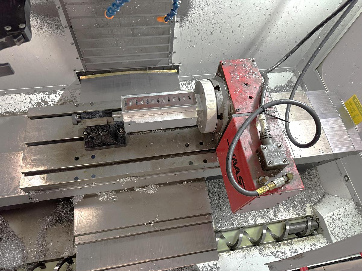 Used 2002 Haas VF2D with Haas Rotary Table, 24 Station Side Mount ATC, Chip Auger, Programmable Coolant