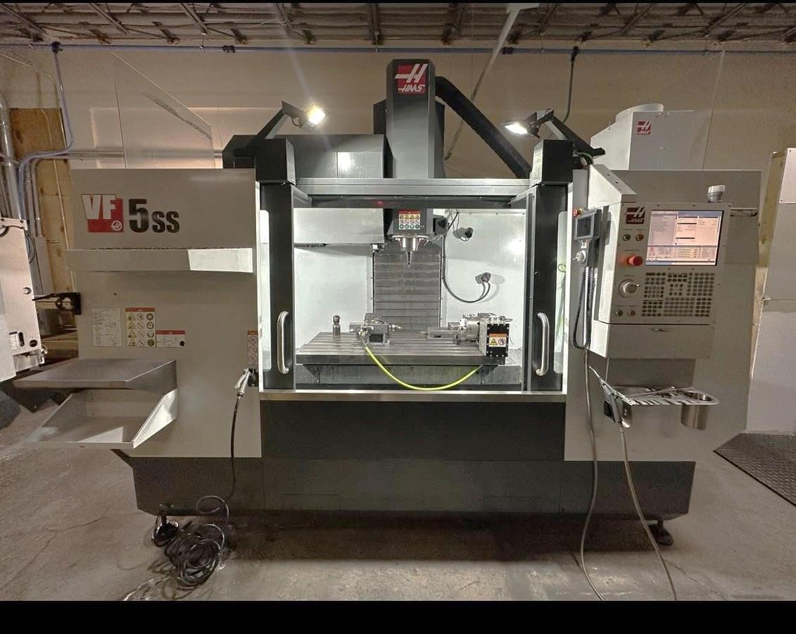 Used 2021 Haas VF-5SS with Haas HRT-160 4th Axis Table, Probing, PCool, Auger, 4th & 5th Axis Drives, Mist Collector, Tooling
