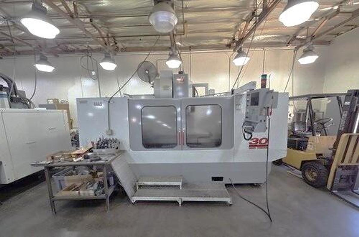 Used 2000 Haas VF-9/40 with 10,000 RPM, Chip Auger, Prog. Coolant, Remote Jog Handle, 40 Pos. Side Mount ATC, 4th Axis Drive