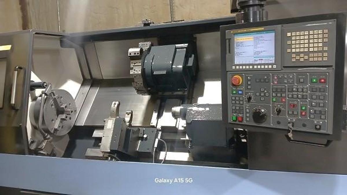 Used 2013 Doosan Puma 400LC with 6.5" Bar Cap, 21" Hyd Chuck, 23.2" TD x 81.7" Turn Length, 50 HP, SMW Hyd Steady, Tailstock, Conveyor