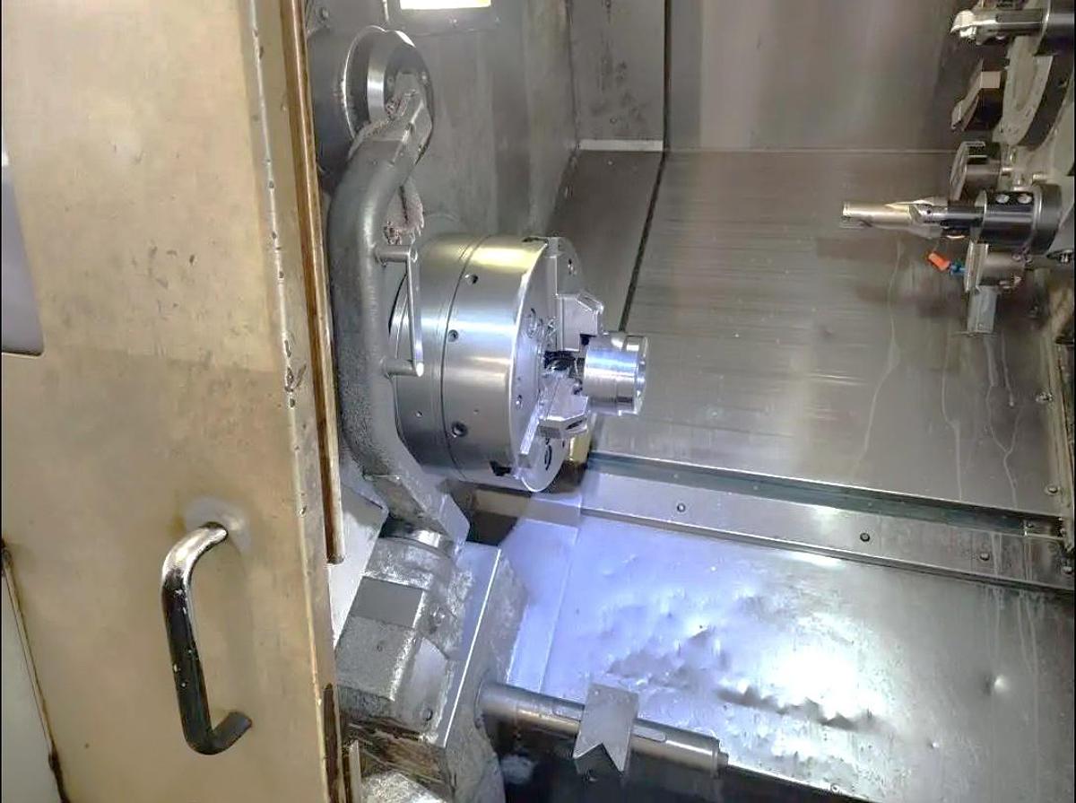 Used 2005 Okuma Captain L470M with C Axis, Milling Capability, 12" Hyd. Chuck, Tailstock, Tool Presetter, Chip Conveyor