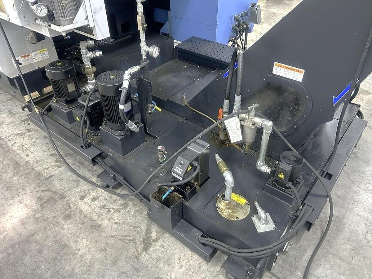 Used 2022 DN Solutions DVF 6500 5 Axis Trunnion VMC with 18,000 RPM, 60 ATC, Coolant Thru Spindle, Probing, Chip Conveyor
