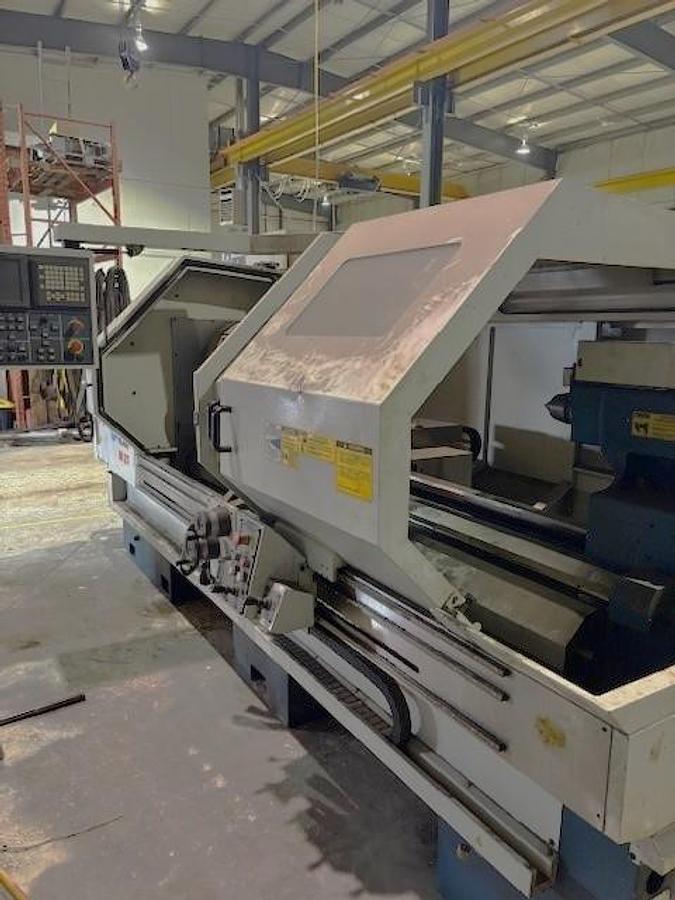 Used 2000 Romi M27 x 80" with 6.77" Big Bore Spindle, Front & Rear Chucks, 8 Station Turret, Tailstock