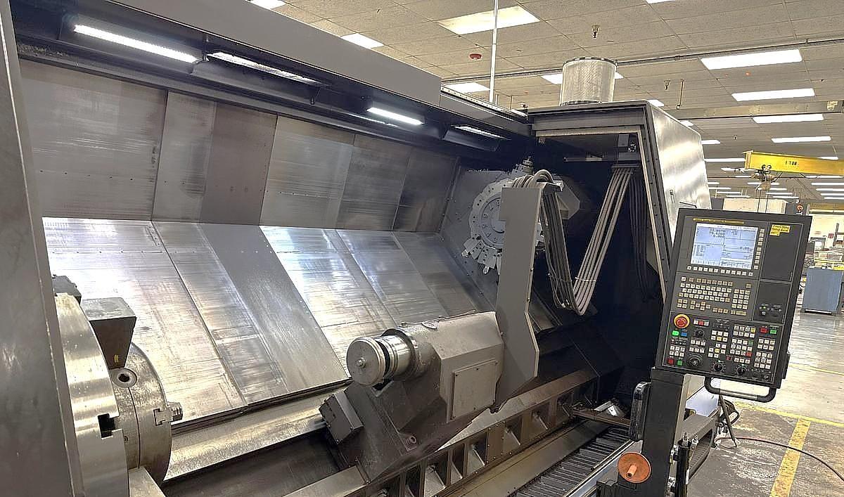 Used 2015 Doosan Puma 800LM with C Axis & Milling, 32" 4 Jaw Manual Chk, 12.6" Bar Cap., 126" Turn Length, New RIP Steady Rest, Tailstock, Conveyor