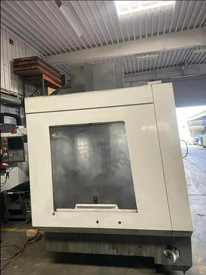 Used 2014 Haas VF5/40 XT with Extended 60" X Axis Travel, Chip Auger, Prog. Cool, 20 Station ATC, Rigid Tap