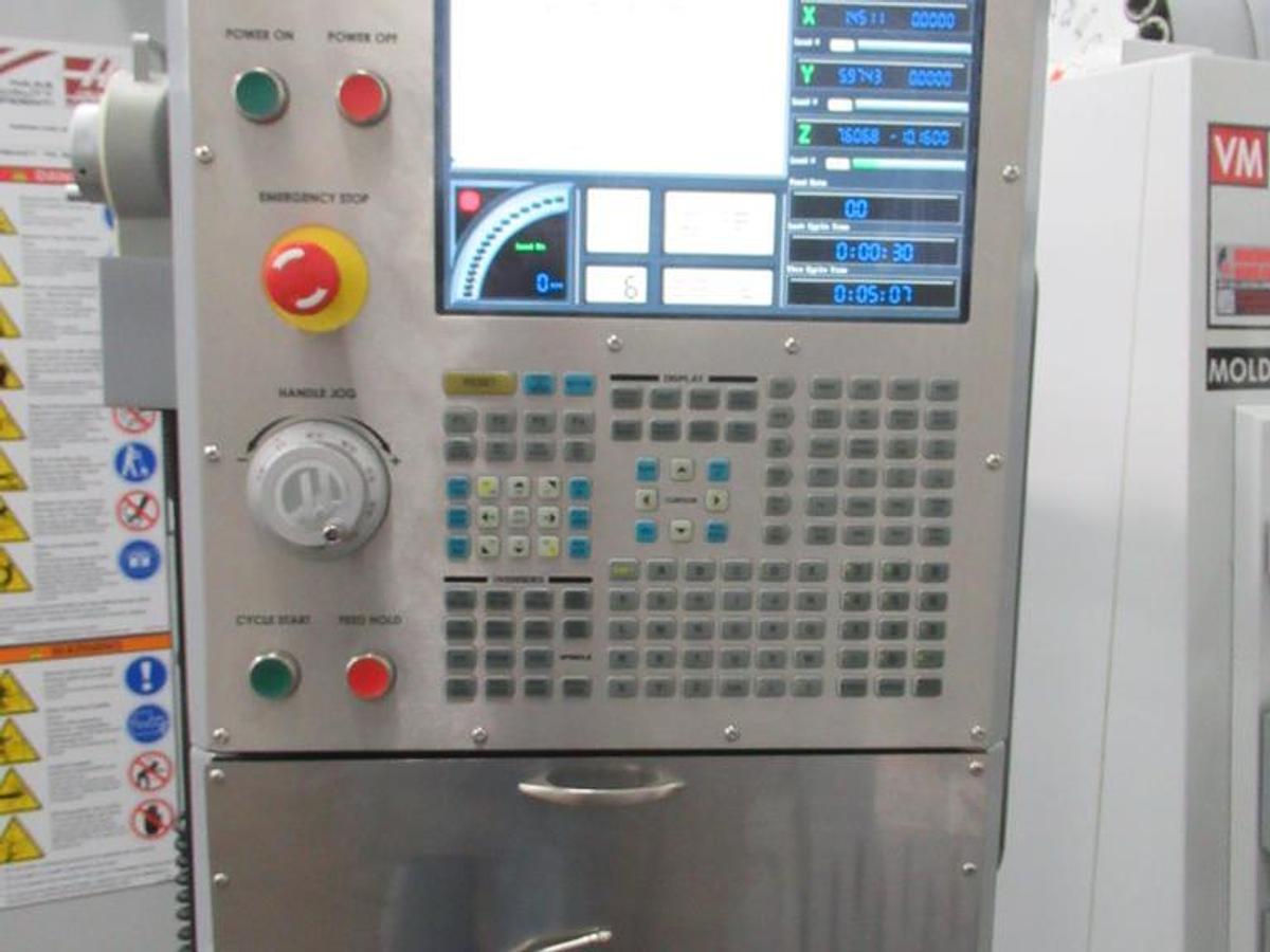 Used 2007 Haas VF2SS with Probing, Chip Auger, Progr. Coolant Nozzle, 24 Station SMATC, Jog Handle, Stevens Fixture Plate