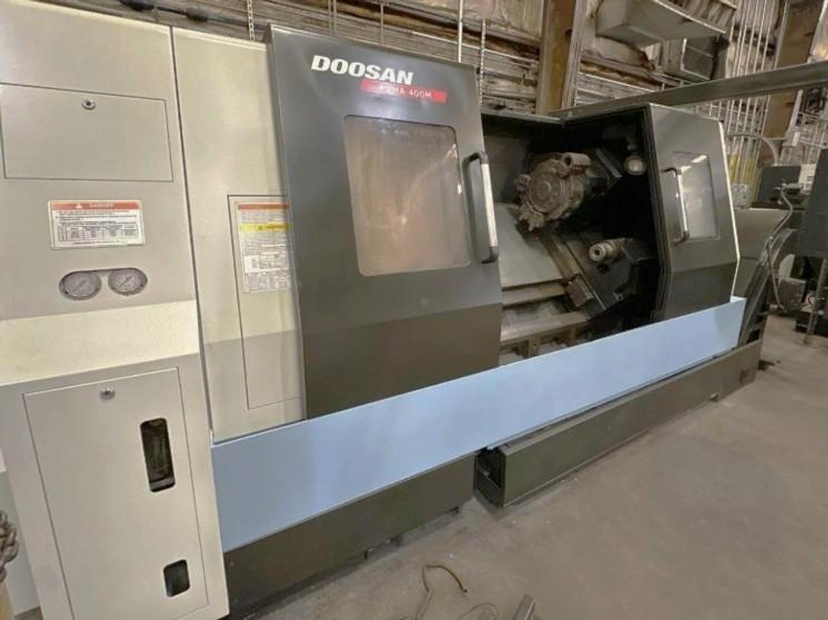 Used 2012 Doosan Puma 400MC with C Axis, Milling Capable, 21" Chuck, 6.5" Bar Capacity, Tailstock, Conveyor, Live Tool Holder
