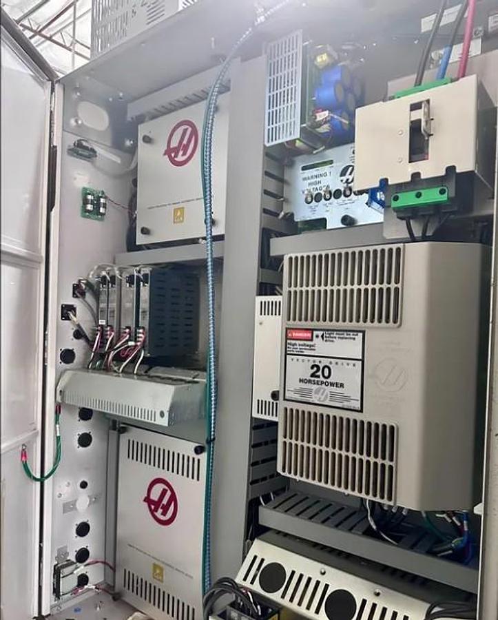 Used 2011 Haas VF5/40 w/ Haas HRT310 Rotary Table, 10,000 RPM, PCool, HSM, Auger