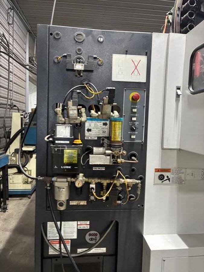 Used 2009 Mazak Nexus VCN 510C/40 II with Chip Conveyor, 48 Station Side Mounted ATC, CAT 40, 12,000 RPM, ONLY 2,201 CUT HOURS!!