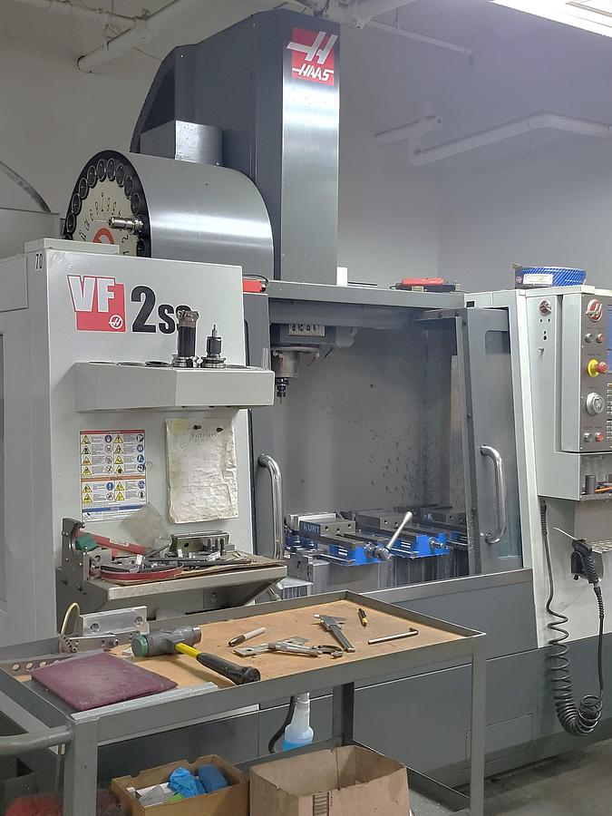 Used 2014 Haas VF2SS with Programmable Coolant, Chip Auger, 24 Station Side Mounted ATC