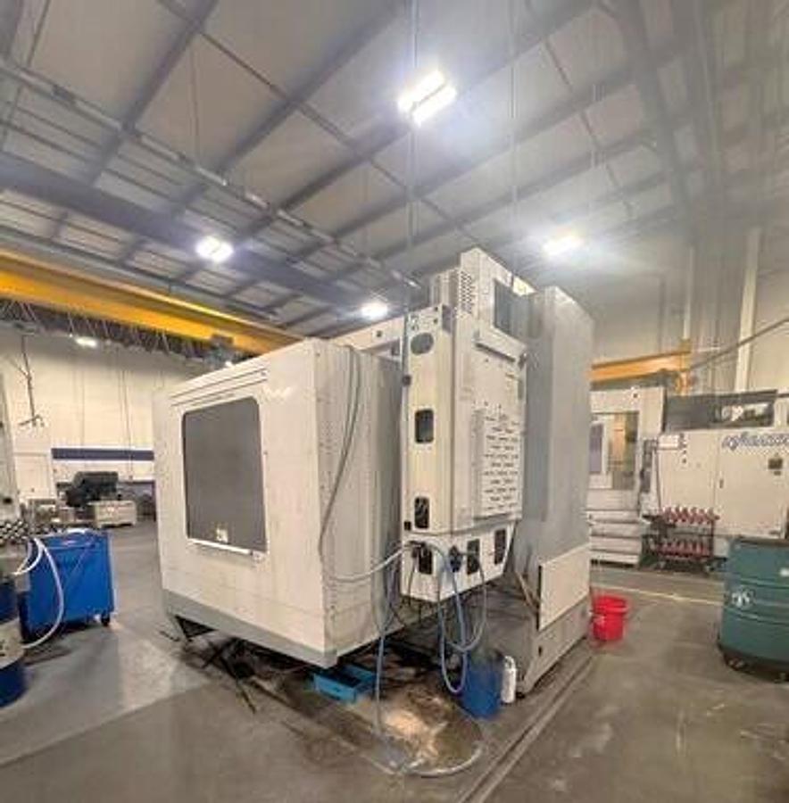 Used 2004 Haas VF8/50 with 50 Taper Spindle, 10,000 RPM Geared Head, Coolant Thru Spindle, Probe Ready, PCool, Auger, Side Mounted ATC