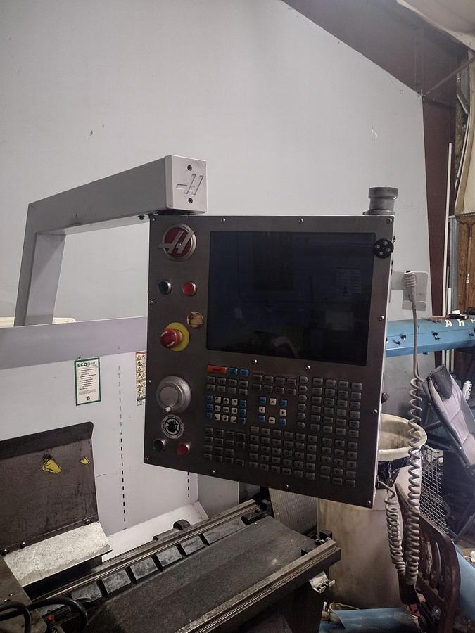 Used 2012 Haas TL-2 with 3" Big Bore Option, Tailstock, 10" 3 Jaw Chuck, Tool Post, Chuck Guard, Manual Hand Wheels