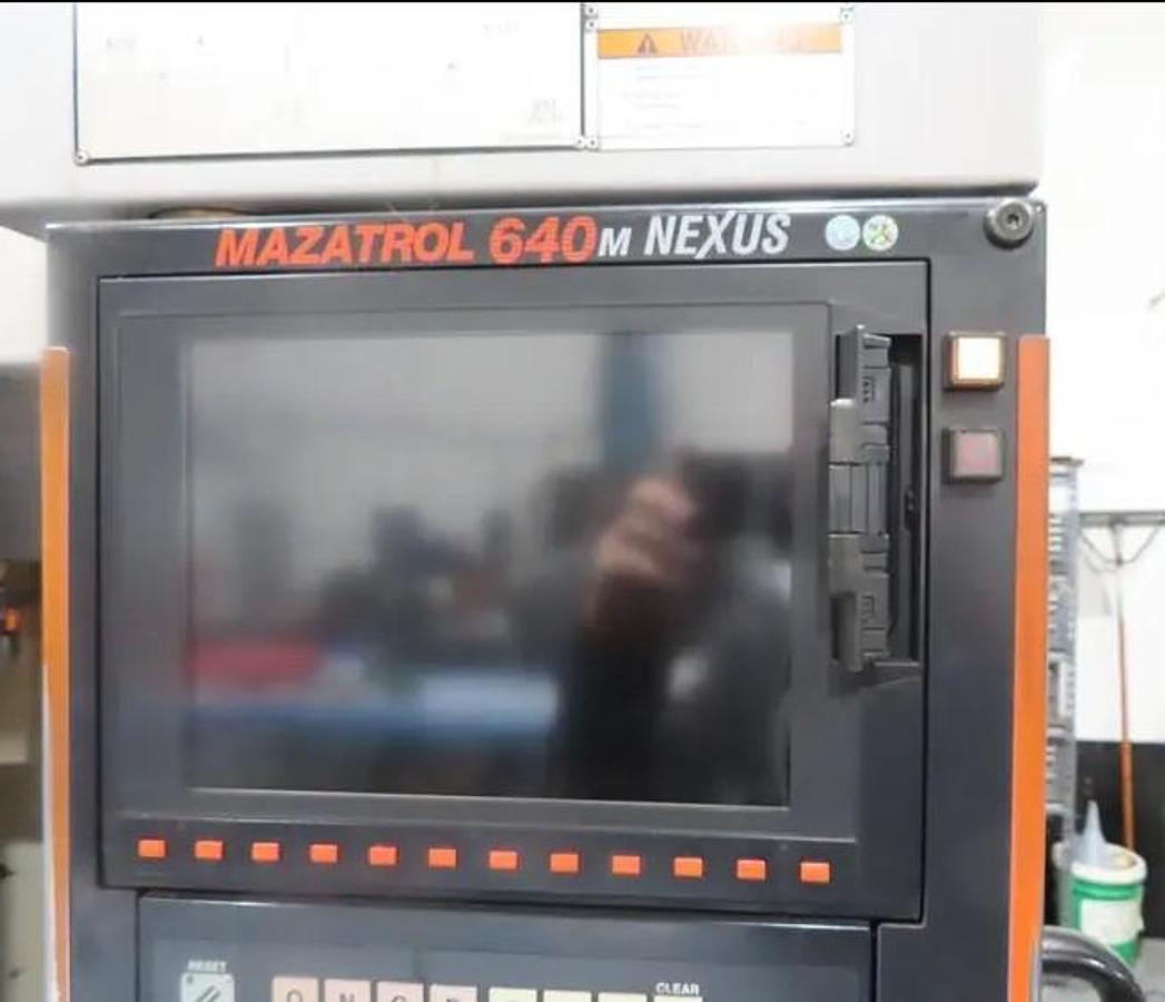 Used 2005 Mazak Nexus VCN-410A with Coolant Thru Spindle, Chip Conveyor, 30 Station Side Mounted ATC, 12,000 RPM