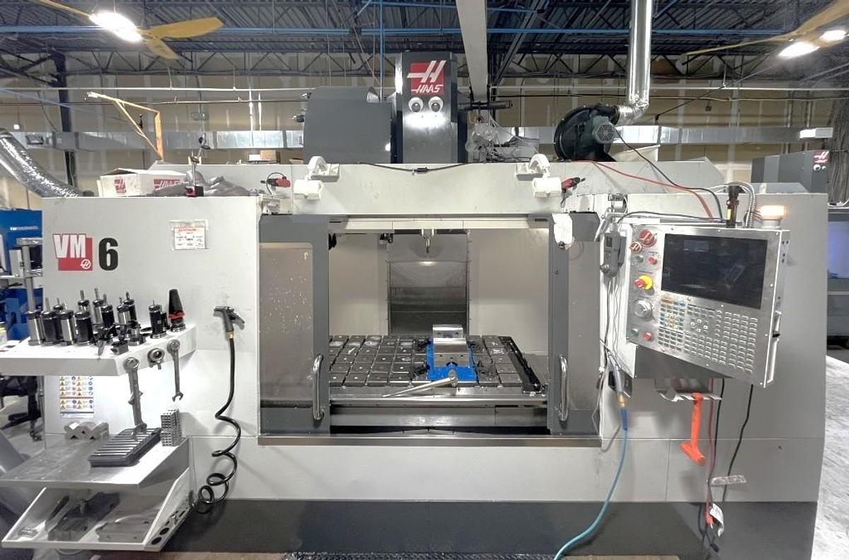 Used 2012 Haas VM-6 with Haas Probing, Coolant Through the Spindle, 4th Axis Drive, Auger, 40 Station ATC, HSM, Boom Crane