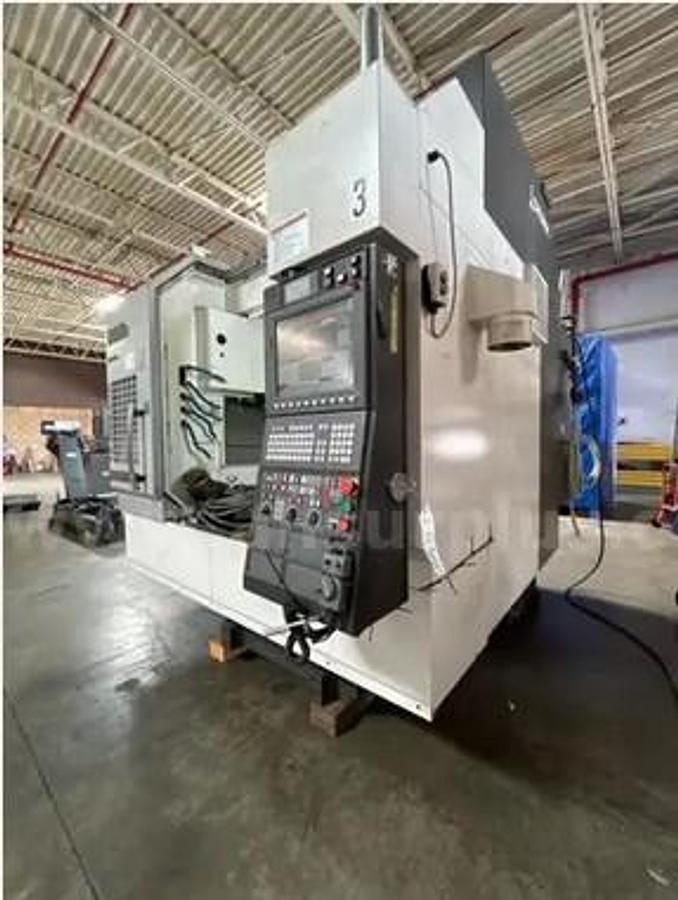 Used 2019 Okuma Genos M560-V with Chip Conveyor, High Pressure Coolant, Tool Probe