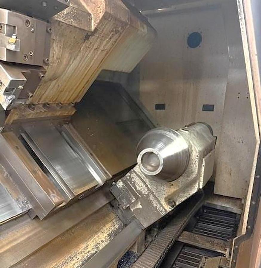 Used 2006 Doosan Puma 700LM with C Axis & Milling, 32" 4 Jaw Man. Chk, 6.5" Bar Cap., 126" Turn Length, SMW Steady Rest, Tailstock, Conveyor