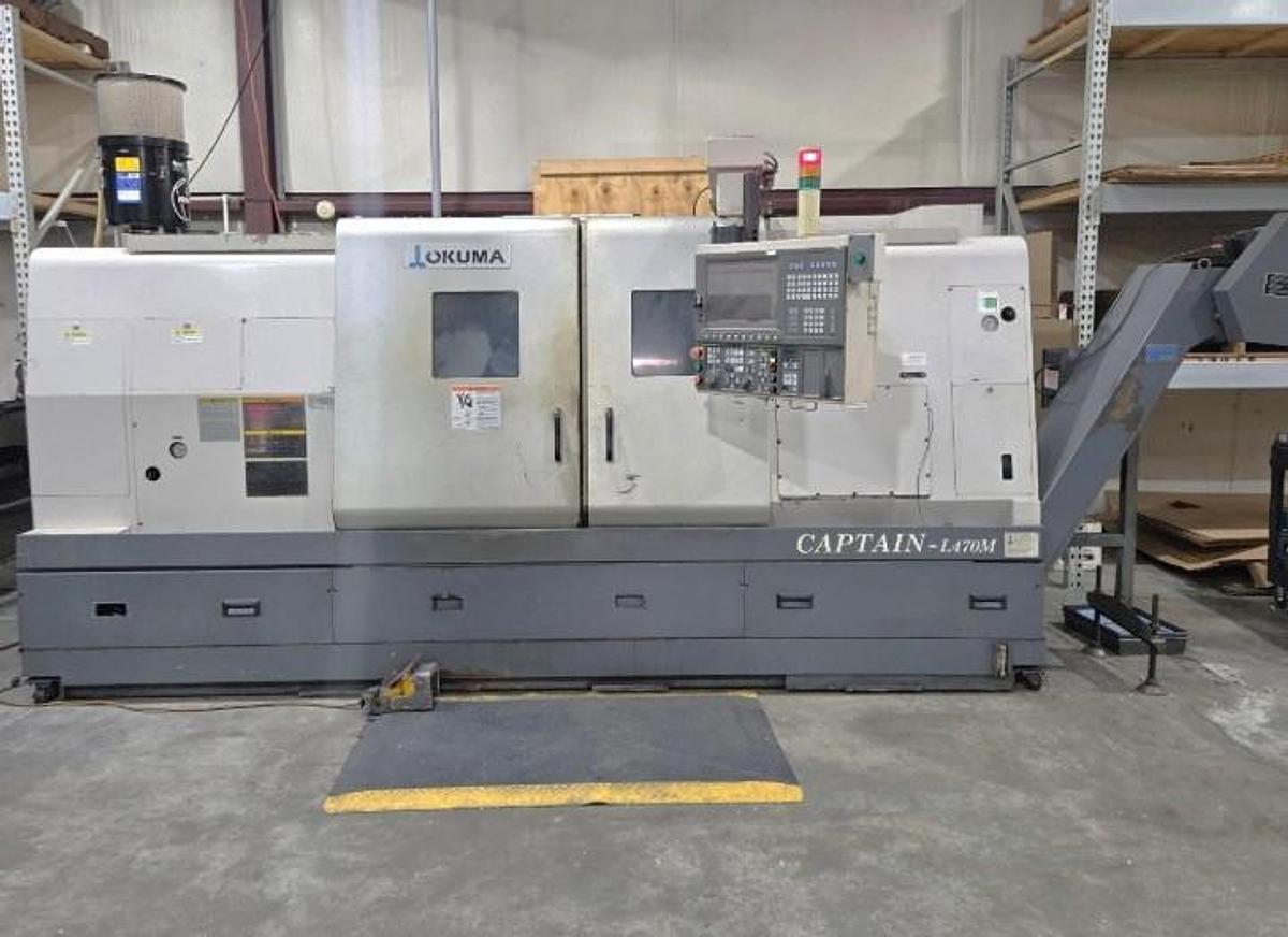 Used 2007 Okuma Captain L470M/1250 Big Bore OSP P-200L with Milling Capability and 3.5" Bar Capacity, Chip Conveyor, Tool Eye