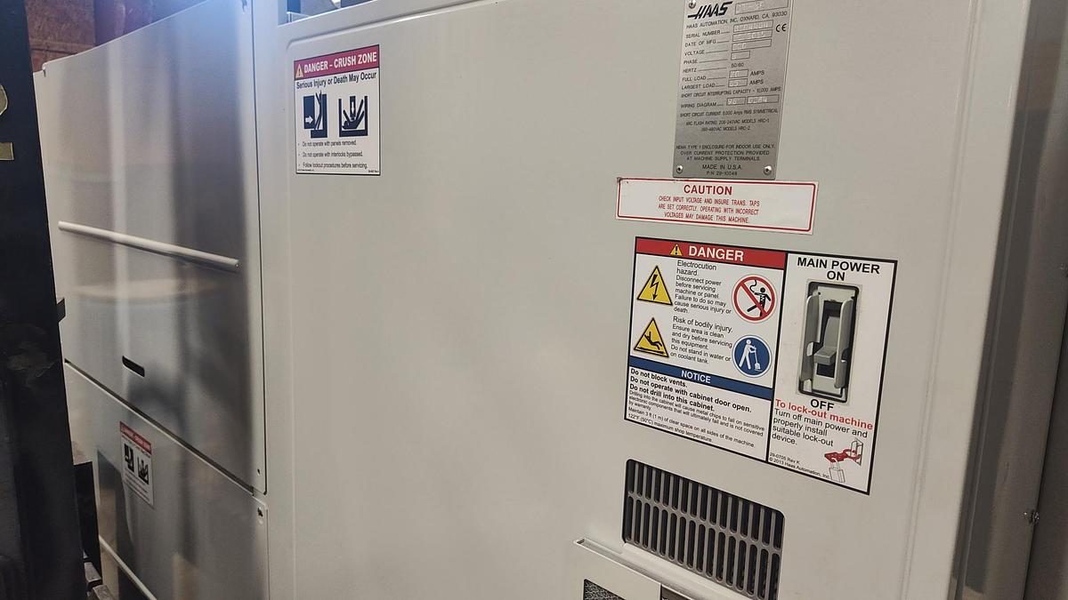 Used 2015 Haas ST-30 Chucker with Haas Servo Bar 300 Barfeed, Chip Conveyor, Parts Catcher, 10" Chuck, 3" Bar Capacity