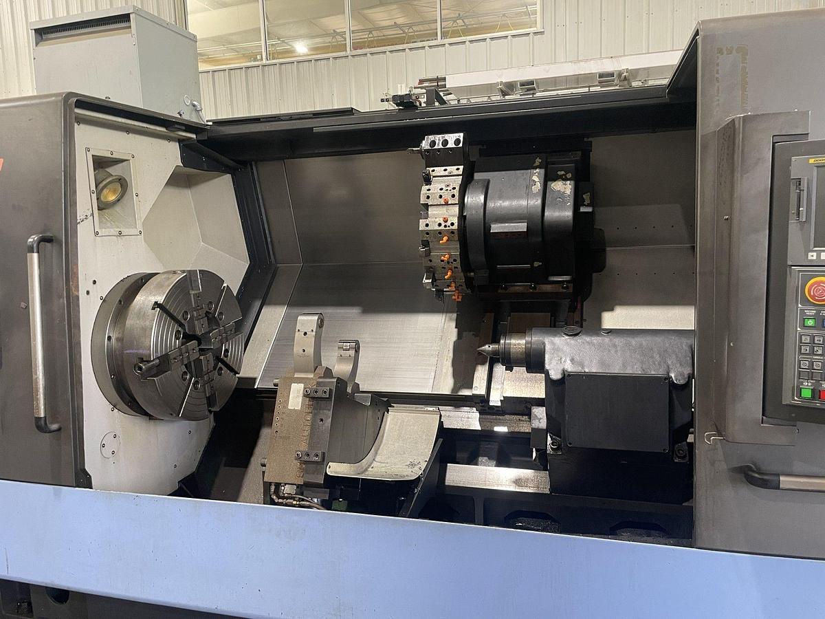 Used 2011 Doosan Puma 480L with 10.8" Bar Cap., (2) 24" Manual Chks, 80" cc, S/R, Tailstock