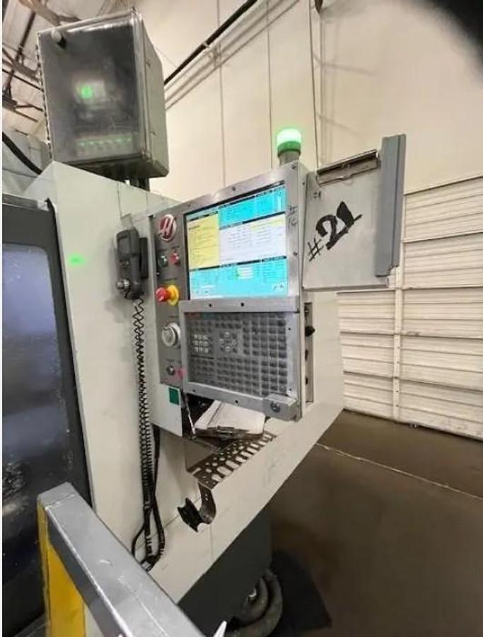 Used 2014 Haas VF-12/40 with Haas HRT-310 4th Axis Rotary Table