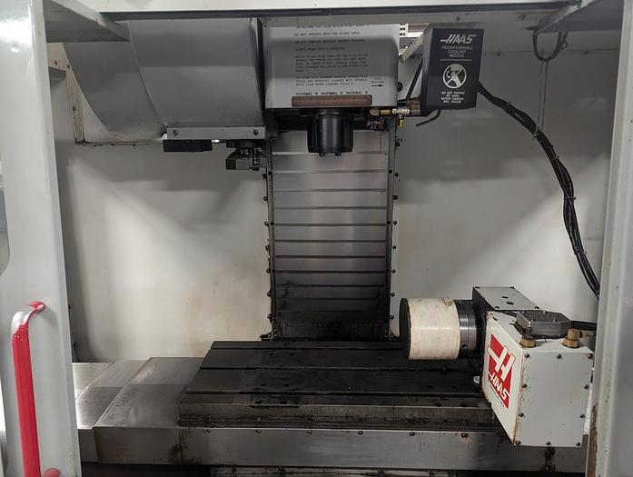 Used 2002 Haas VF-2D with Haas HRT-160 Rotary Table, 15,000 RPM Spindle, 24 Station Side Mounted Tool Changer, Auger, Pcool