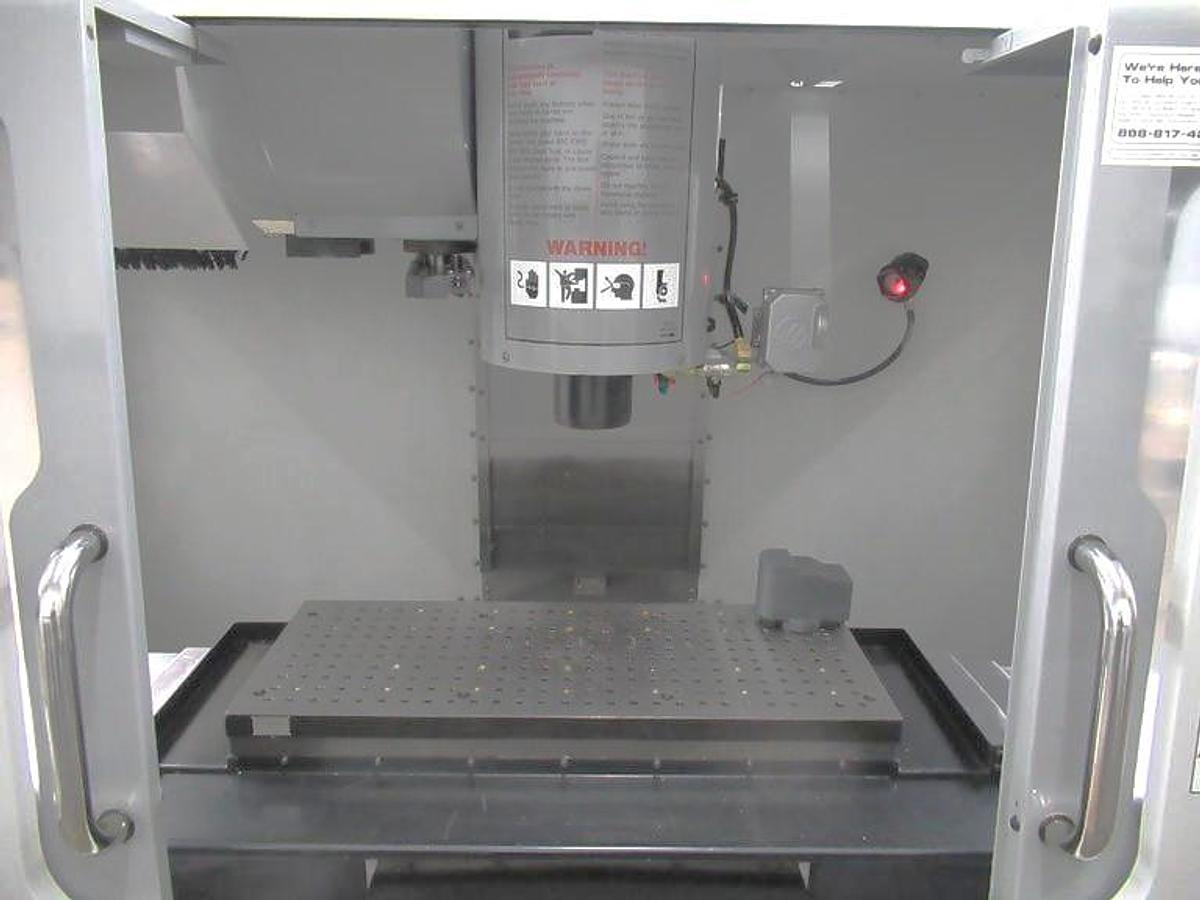Used 2007 Haas VF2SS with Probing, Chip Auger, Progr. Coolant Nozzle, 24 Station SMATC, Jog Handle, Stevens Fixture Plate