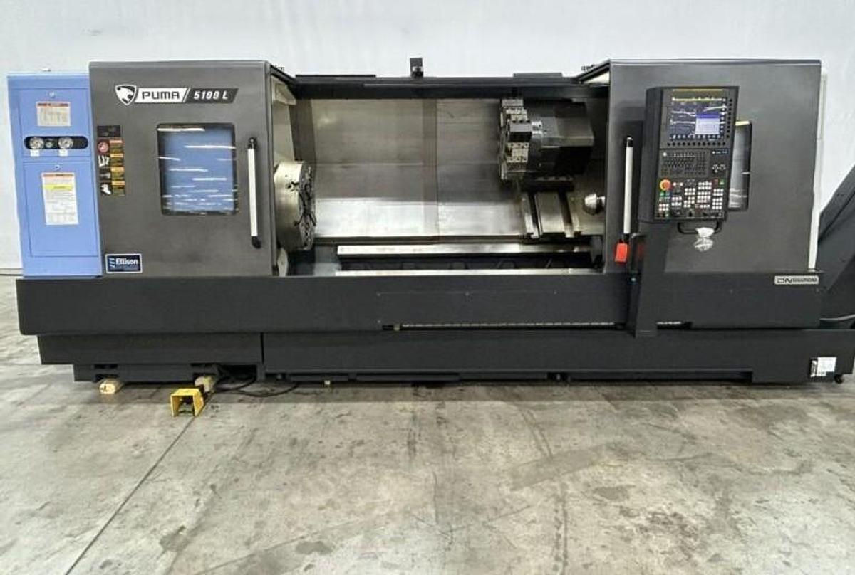 Used 2022 DN Solutions Puma 5100LC with 24.75" 4 Jaw Hyd. Chuck, 10.5" Spindle Bore, 82" Turn Length, Chip Conveyor, Tailstock