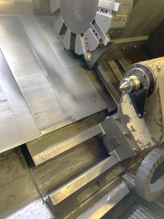 Used 2006 Leadwell LTC50-BL with 18" Hyd Chk, 4.6" Bar Cap., 33.5" sw, 80" cc, 1500 RPM, 50 HP, Steady Rest, Conveyor, Fanuc 0i-TC