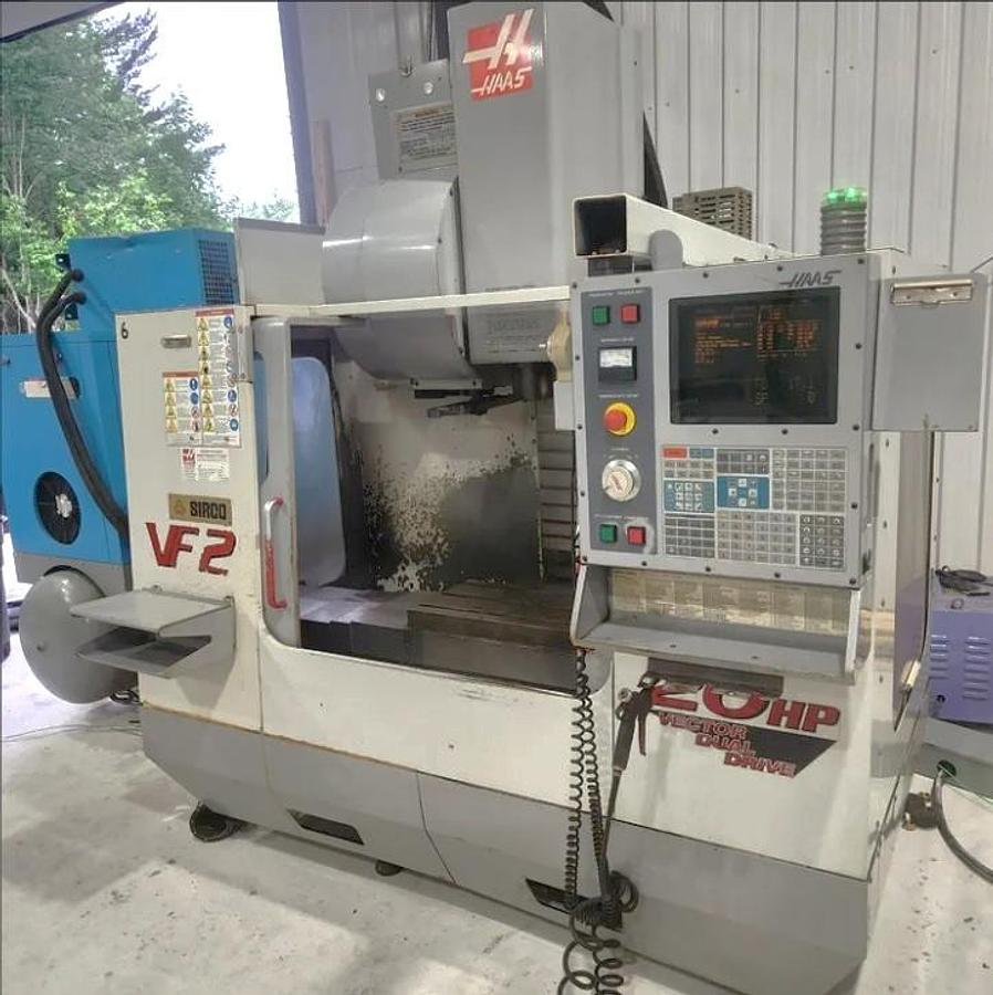 Used 2001 Haas VF2 with 4th Axis Drive, Programmable Coolant, Chip Auger, USB Emulator, Rigid Tapping, 24 Station Side Mounted ATC
